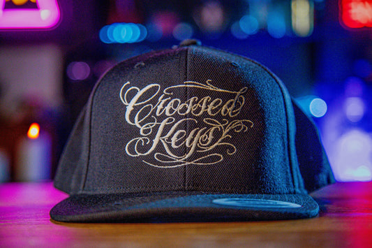 Crossed Keys (Cursive Text)